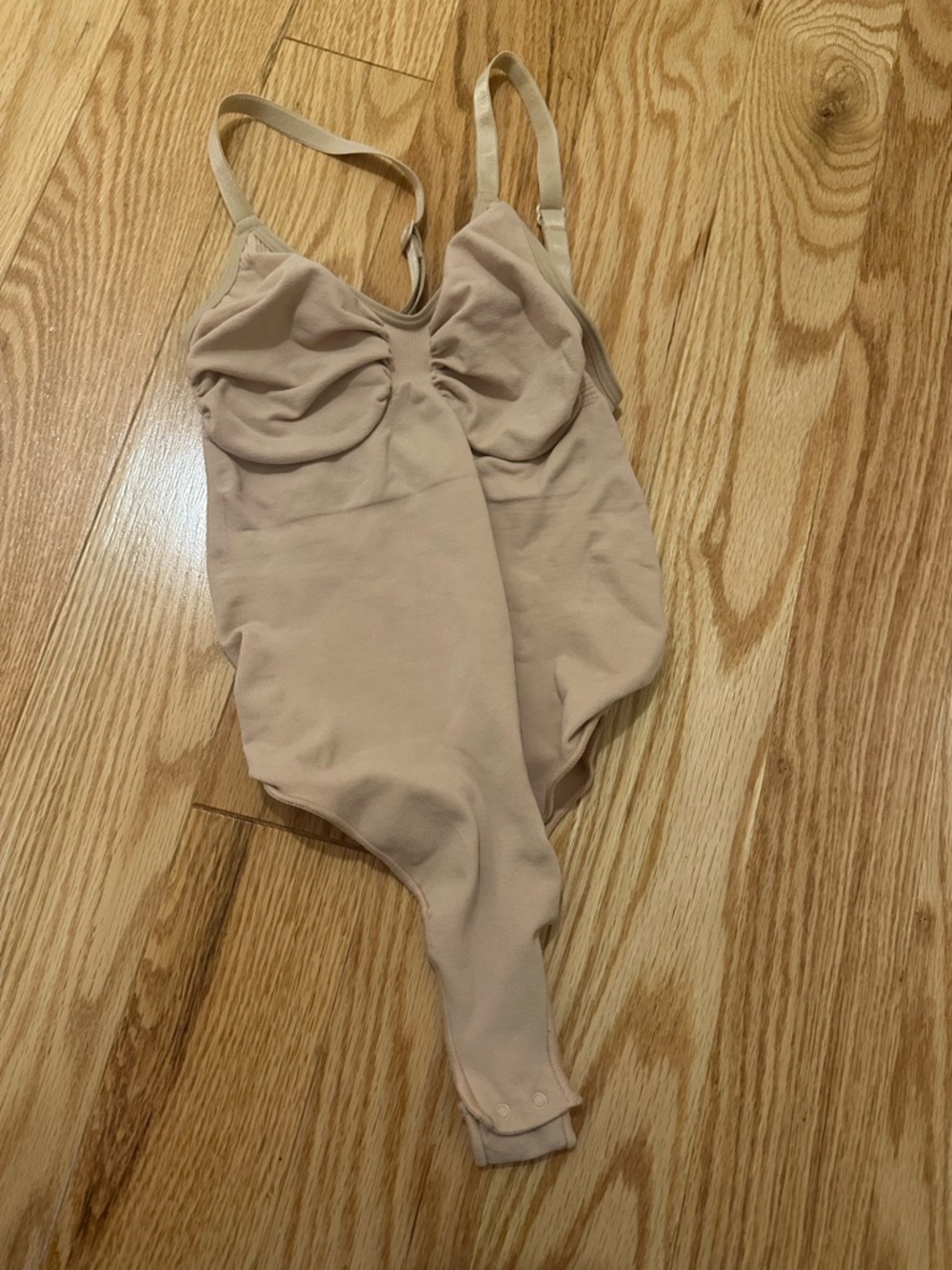 Skims body suit thong beige